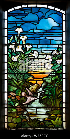 UK, Cumbria, Sedbergh, Marthwaite, St Gregory’s church window, depicting natural riverside scene Stock Photo