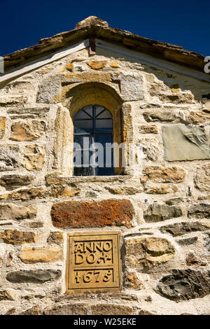 UK, Cumbria, Sedbergh, Brigflatts, Religious Society of Friends, Quaker Meeting House exterior, 1675 date stone on porch Stock Photo