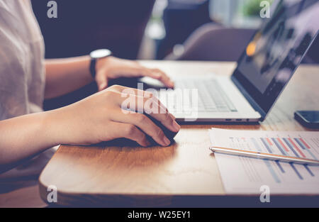 Young people working with modern laptop in workplace,cafe.business activity concepts Stock Photo