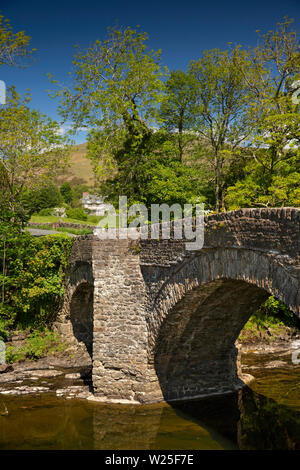 UK, Cumbria, Sedbergh, Millthrop. view towards Howgill Fells from old stone bridge across River Rawthey,