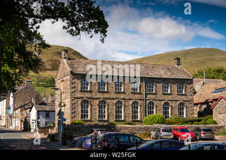 UK, Cumbria, Sedbergh, Finkle Street, Sedbergh School library in historic building at Back Lane junction with Howgill Fells in distance
