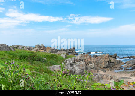 Beautiful Tanesashi kaigan Coast. The coastline includes both sandy and rocky beaches, and grassy meadows scenic views Stock Photo