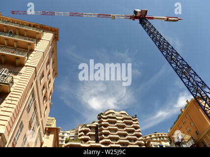 Building construction in Monaco. Construction crane Stock Photo