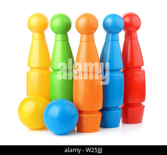 Front view of toy plastic bowling pins and balls isolated on white Stock Photo