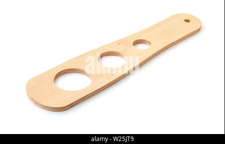 Wooden spaghetti pasta measuring tool isolated on white Stock Photo