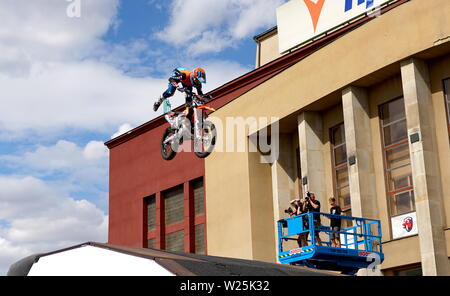 Stunt Fighters show. Rider shows amazing handlebar tricks. Stock Photo