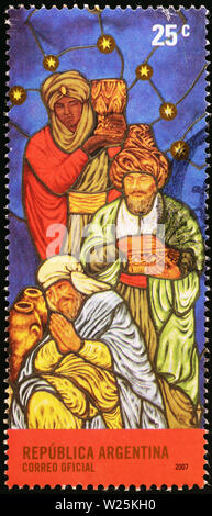 Three wise men in stained glass window, stamp of Argentina Stock Photo