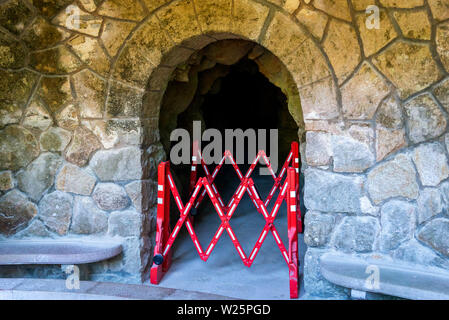 Close up of folding fence or red and white folding barrier. No entry or passage is closed. Stock Photo