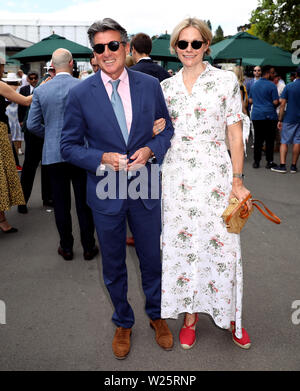 Lord Sebastian Coe and Lady Coe arrive on day six of the Wimbledon Championships at the All England Lawn Tennis and Croquet Club, Wimbledon. Stock Photo