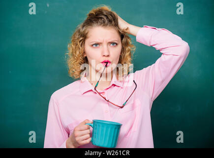 Fresh coffee. school teacher need coffee break. good morning. girl refreshing with tea drink. idea and inspiration. energy and vigor. energy charge. woman with coffee cup at blackboard. Stock Photo