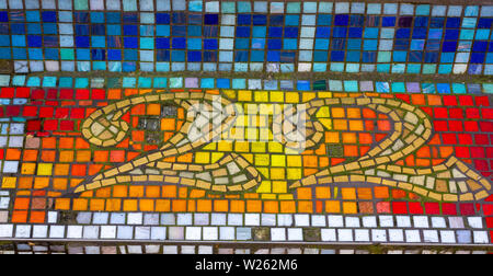 House number 22 with the twenty-two set as a yellow number in colourful mosaic tiles Stock Photo