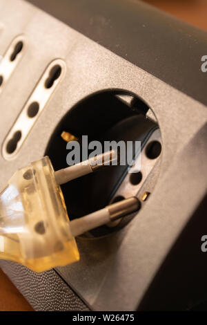 Voltage power socket plug with multi-socket closeup - Image Stock Photo
