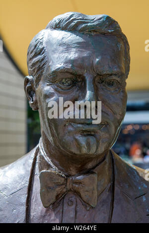 Bristol, UK - June 30th 2019: A statue of Hollywood legend Cary Grant, located on Millennium Square in Bristol, UK.  Cary Grant was born in Bristol in Stock Photo