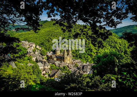 Elevated view of Conques village and abbey-church of Sainte-Foy the jewel of Romanesque art, Occitanie, France. Stock Photo