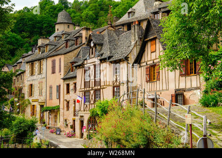 Street view of Conques village and abbey-church of Sainte-Foy the jewel of Romanesque art, Occitanie, France. Stock Photo