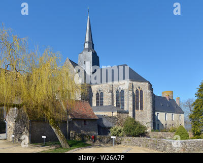 Church of Sainte-Suzanne and willow tree, ranked one the most beautiful villages, fortified town in the Mayenne department, Pays-de-la-Loire region Stock Photo