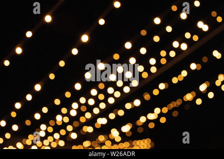 Abstract background yellow bokeh lights, warm feeling, warmth, party or celebration lights Stock Photo
