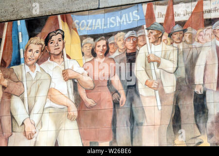 Meissen porcelain tiles Detail, Socialist realism art from the Communist German Republic, Ministry of Finance, Berlin Germany socialist mural Stock Photo