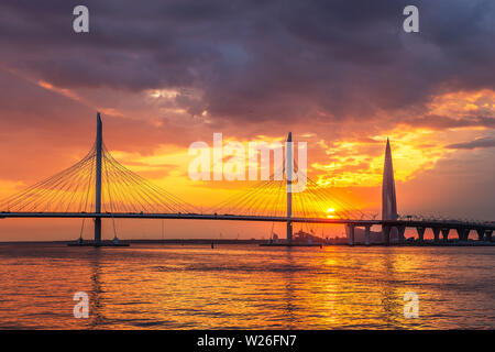 View of the cable-stayed bridge and the bay, in the distance the Lakhta Center building, the tallest building in Europe Stock Photo