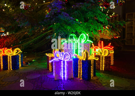 Berlin, Germany - December 18, 2017: Decorative illuminated Christmas packages at night in Breitscheidplatz in Berlin. Stock Photo