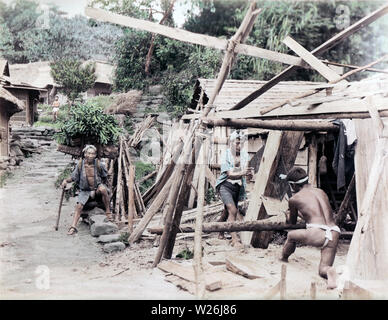 [ 1890s Japan - Japanese Carpenters ] —   Carpenters at work in a village.  19th century vintage albumen photograph. Stock Photo