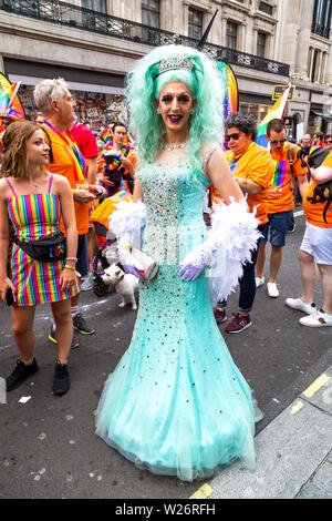 6 July 2019 - Drag queen in an aqua blue gown and wig, London Pride Parade, UK Stock Photo