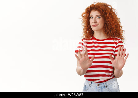 No take away from me. Displeased uncomfortable redhead attractive girlfriend pass raise hands stop rejection gesture asking enough hold willing end re Stock Photo