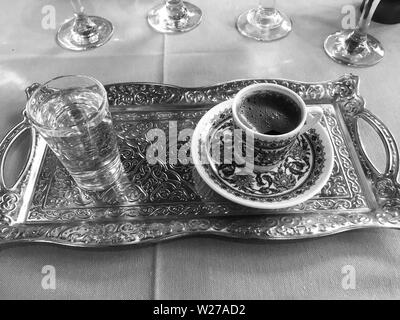 Turkish coffee in a typical painted ceramic cup Stock Photo