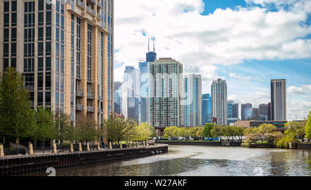 Chicago cityscape, spring day. Chicago city waterfront high rise buildings on the river canal, blue sky background Stock Photo