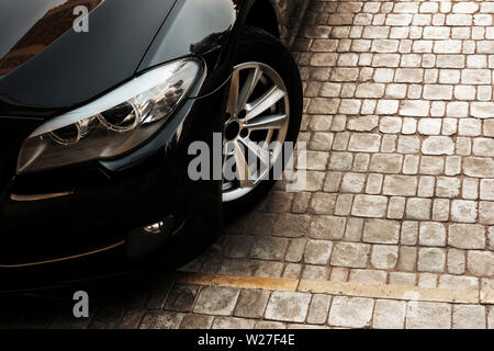 Front part of luxurious black car Stock Photo