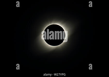 The Solar Corona atmosphere layer during Total Solar Eclipse Chile 2019, amazing view of the Sun covered by the Moon during totality phase Stock Photo