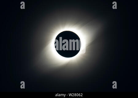 The Solar Corona atmosphere layer during Total Solar Eclipse Chile 2019, amazing view of the Sun covered by the Moon during totality phase Stock Photo