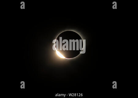 The Baily's beads effect and Diamond Ring effect during Total Solar Eclipse Chile 2019, amazing view of the Sun covered by the Moon during totality Stock Photo