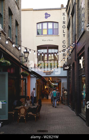 London, UK - June, 2019. Entrance of Kingly Court, a three-floored mini mall off Carnaby Street, known as the area's food quarter. Stock Photo