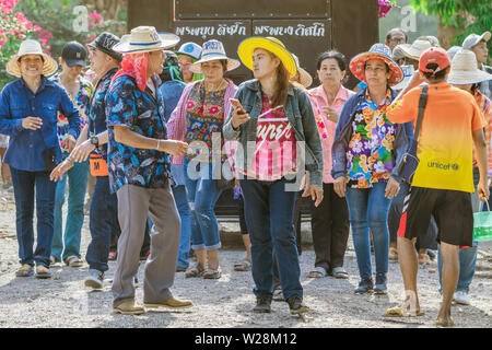 RATCHABURI-Thailand, April 14, 2019 : Unidentified Thai dancers with new monk and music band parade in Buddhist ordination ceremony at local road go t Stock Photo