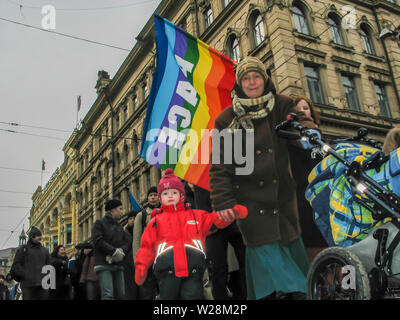 Helsinki, Finland - March 22, 2003: Anti-war protesters march through downtown Helsinki to protest the impending United States invasion of Iraq. Stock Photo