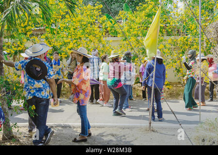 RATCHABURI-Thailand, April 14, 2019 : Unidentified Thai dancers with new monk and music band parade in Buddhist ordination ceremony at local road go t Stock Photo