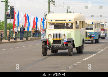 SAINT-PETERSBURG, RUSSIA - MAY 25, 2019: Soviet bus GAZ 03-30 in the column of retro transport. Fragment of a retro transport parade in honor of the C Stock Photo