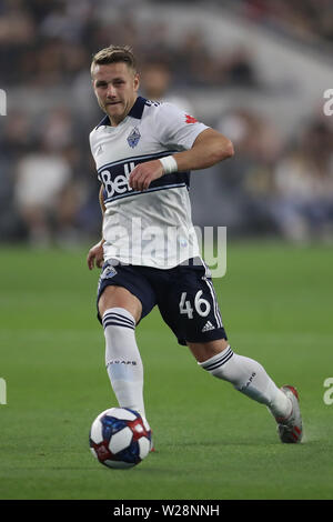 Los Angeles, CA, USA. 6th July, 2019. Vancouver Whitecaps midfielder Brett Levis (46) passes the ball to a teammate during the game between Vancouver Whitecaps and Los Angeles FC at Banc of California Stadium in Los Angeles, CA., USA. (Photo by Peter Joneleit) Credit: csm/Alamy Live News Stock Photo