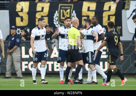 Los Angeles, CA, USA. 6th July, 2019. Vancouver players argue one of many questionable no calls with the referee during the game between Vancouver Whitecaps and Los Angeles FC at Banc of California Stadium in Los Angeles, CA., USA. (Photo by Peter Joneleit) Credit: csm/Alamy Live News Stock Photo