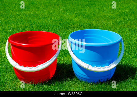 Multicolored Small Buckets On White Background Stock Photo 1146883430