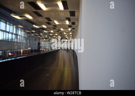 Vienna, Austria: May/20/2019 - Vienna International Airport (built in 1938 and the largest airport in Austria). Empty interior hall near terminal 3. Stock Photo