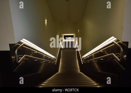 Vienna, Austria: May/20/2019 - Vienna International Airport (built in 1938 and the largest airport in Austria). Beautiful illuminated steps Stock Photo