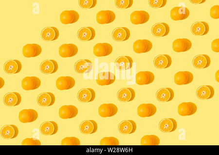 Orange seamless pattern on yellow background Stock Photo