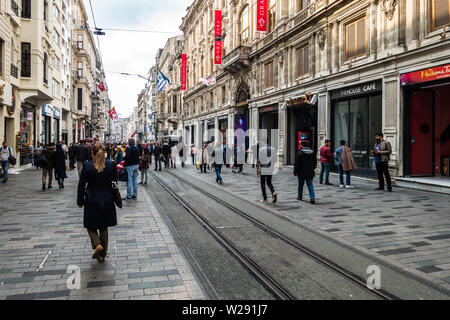 Istiklal Avenue is an elegant pedestrian street in Istanbul Beyoglu district which houses shops, restaurant, café, boutique and art galleries Stock Photo