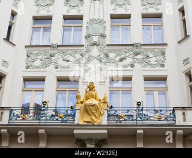 Looking up at an ornate building facade in Art Nouveau style in Karlova street in the Old Town in Prague, Czech Republic Stock Photo