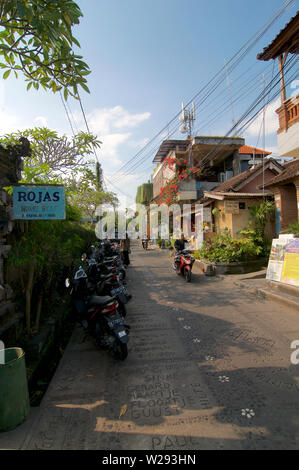 Ubud, Bali, Indonesia - 15th May 2019 : View on the Jalan Kajeng Road one of the most characteristic streets in the city center of Ubud in Bali, Indon Stock Photo