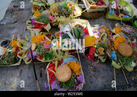 Close up picture of some beautiful decorated Canang Sari, the religious Balinese daily offerings to the gods of the Island Stock Photo