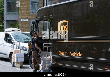 A United Parcel Service (UPS) delivery van on the streets of London, UK Stock Photo