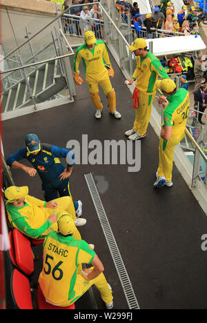 MANCHESTER, ENGLAND. 06 JULY 2019:  Australia wait on the team balcony  during the Australia v South Africa, ICC Cricket World Cup match, at Old Trafford, Manchester, England. Stock Photo